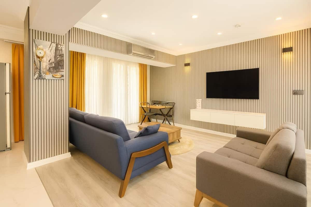Family Apartment, 2 Bedrooms, Balcony, Garden View | Egyptian cotton sheets, premium bedding, down comforters, minibar