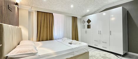 Design Apartment, 2 Bedrooms, Kitchen, Garden View | Bathroom | Shower, hair dryer, bathrobes, slippers