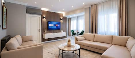 Lägenhet Deluxe - 1 sovrum - 2 badrum - utsikt mot trädgården | Egyptiska bomullslakan, sängtillbehör av högsta kvalitet och duntäcken