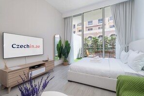Comfort Studio, Balcony | Individually decorated, iron/ironing board, cribs/infant beds - Brand New & Modern Studio JVC (Dubai)