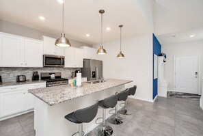 Fridge, microwave, stovetop, dishwasher - Family Luxury 7BR Pool Home at Solterra (Davenport)