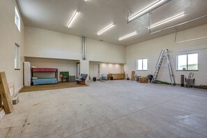 A spacious room with a bunk bed, a desk, and a ladder. - 5 Mi to Devil Creek Reservoir: Idaho Farmhouse! (Malad City)