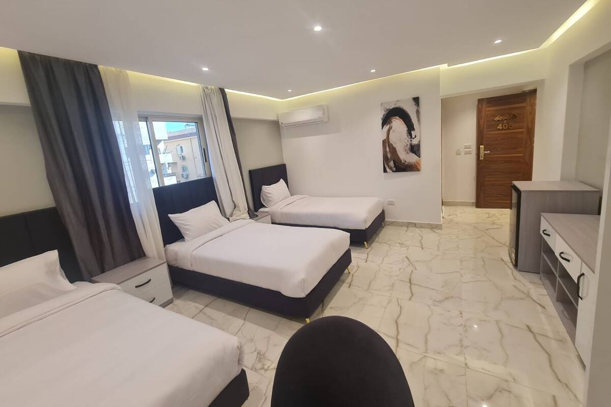 Triple room | 埃及棉床单、高档床上用品、羽绒被、记忆海绵床垫