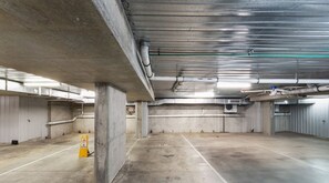 Park your vehicle in this secure parking area with designated spaces and easy access.