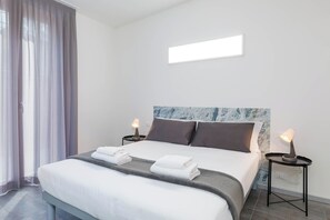 1 dormitorio, tabla de planchar con plancha, cuna de viaje y wifi