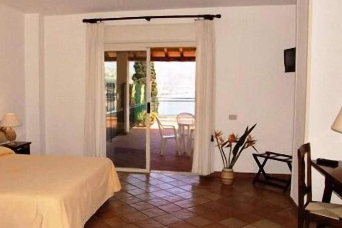 Family Room, 1 Bedroom, Sea View | 1 bedroom, in-room safe, individually decorated, individually furnished