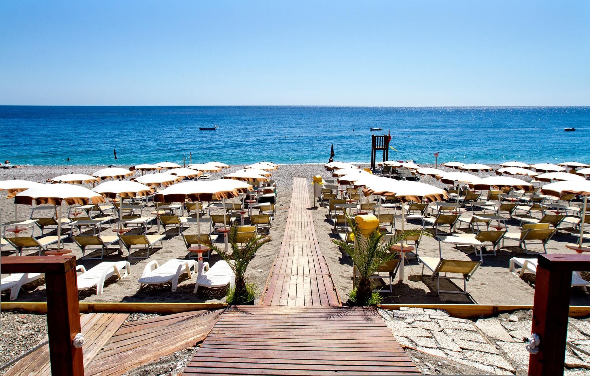 Beach shuttle, sun loungers, beach umbrellas, beach towels