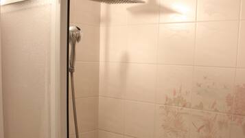 Hair dryer, towels, soap, shampoo