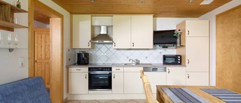 Fridge, oven, dishwasher, coffee/tea maker
