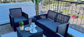 Charming T2 apartment with large terrace close to town center