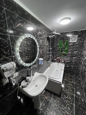 Family Apartment, Balcony, City View | Bathroom | Slippers, bidet