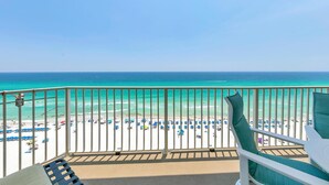 A balcony with a view of a beach and ocean. - Grandview East 1201 (Panama City Beach)