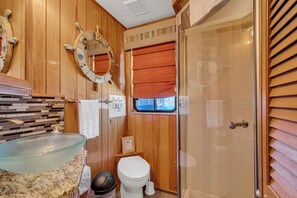 Shower, towels, soap, toilet paper
