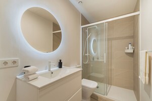 Apartment, 1 Bedroom | Bathroom | Shower, free toiletries, towels, soap