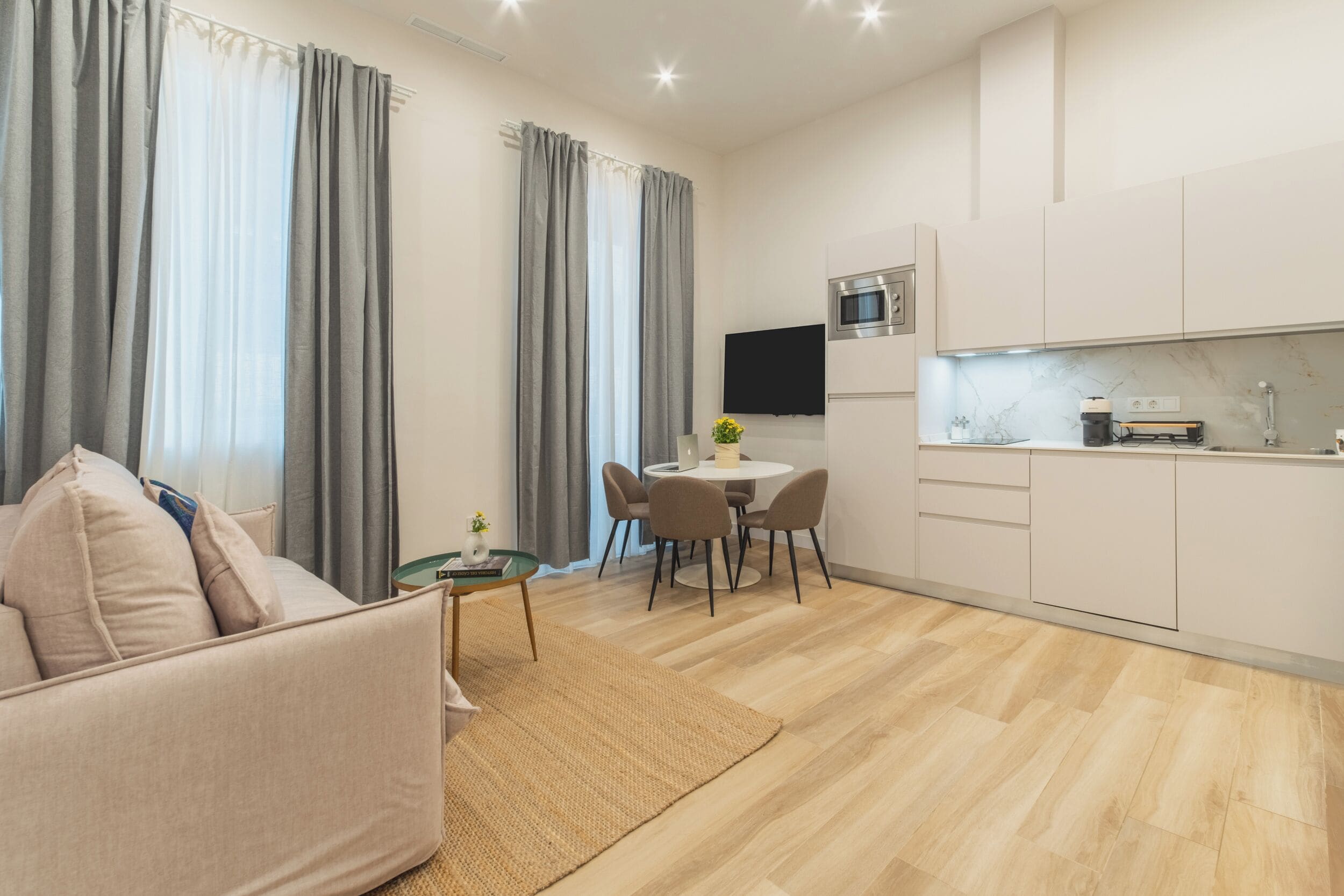 Luxury Apartment, Balcony, City View | Living area | 40-inch TV with digital channels