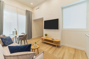 Duplex, 2 Bedrooms | Living area | 40-inch TV with digital channels - Urania Cádiz Apartments by Soho Boutique (Cádiz)