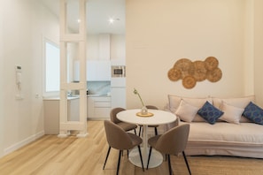 Apartment, 1 Bedroom | Living area | 40-inch TV with digital channels - Urania Cádiz Apartments by Soho Boutique (Cádiz)