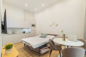 Duplex, 2 Bedrooms | Living area | 40-inch TV with digital channels - Urania Cádiz Apartments by Soho Boutique (Cádiz)