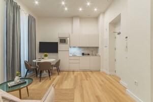 Apartment, 2 Bedrooms | Living area | 40-inch TV with digital channels