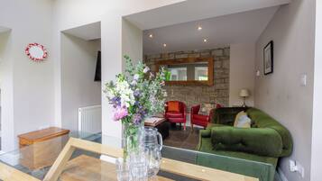 Traditional House | Living room | 41-inch LED TV with digital channels, Netflix, ping pong