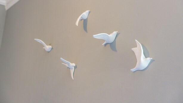 A ceiling with five white paper cutouts of birds in flight. - Spindlestone House - North East Escapes (Belford)