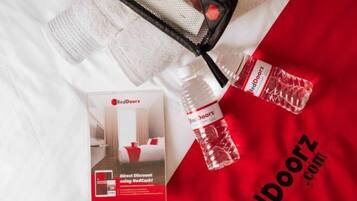 A brochure for RedDoorz, a direct discount service offering RedCash.