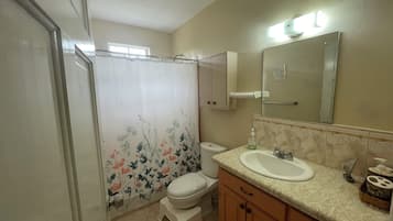 Shower, hair dryer, towels, soap