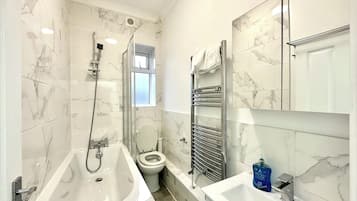 Hair dryer, towels, soap, shampoo