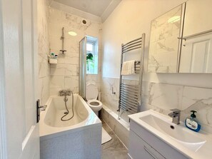 Hair dryer, towels, soap, shampoo
