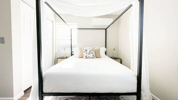 1 bedroom, desk, iron/ironing board, travel crib