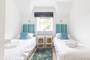 Ropa de cama de alta calidad y tabla de planchar con plancha 