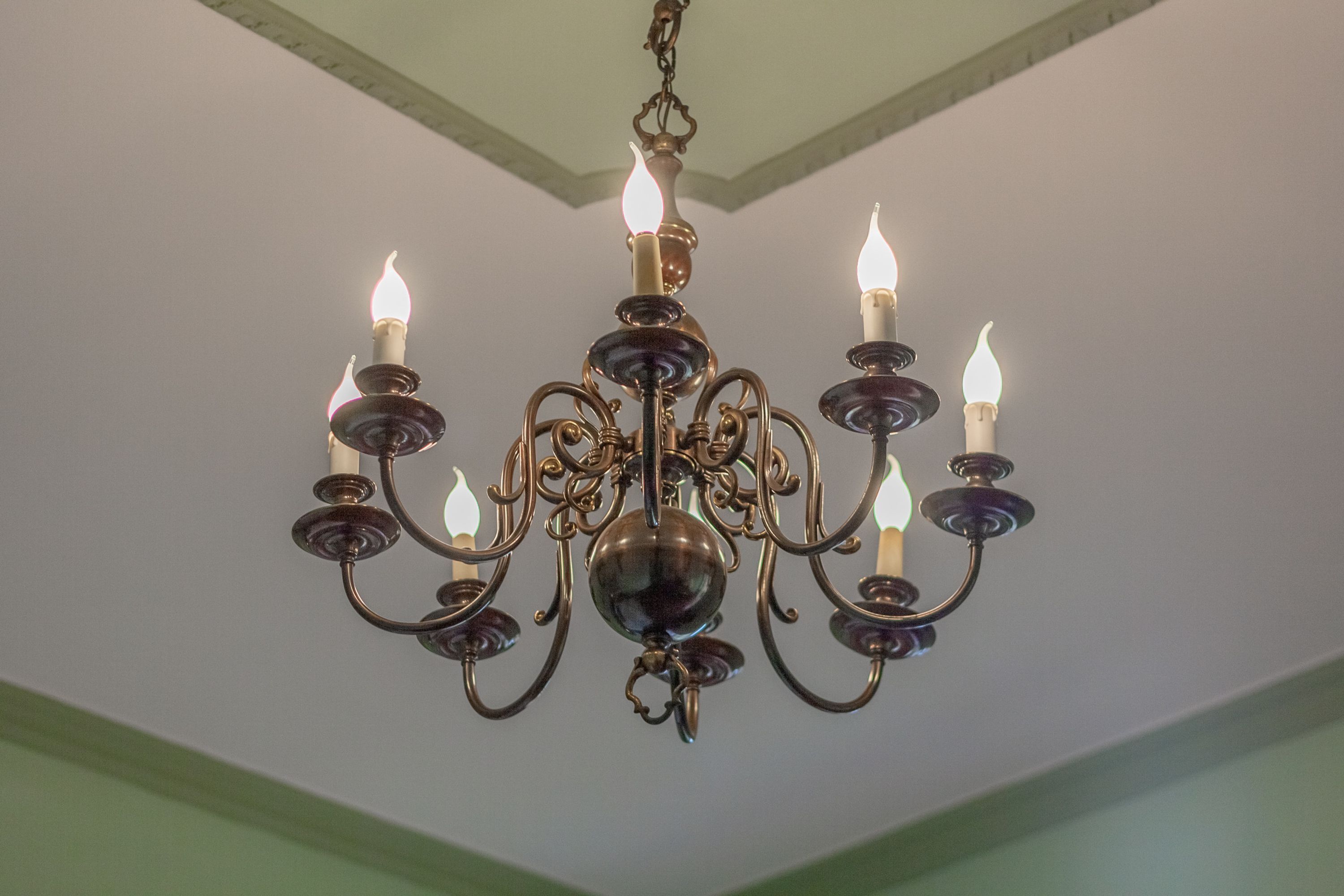 A chandelier with multiple candle-like lights.