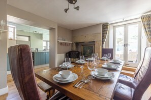 Cottage, uitzicht op tuin | Dineerruimte