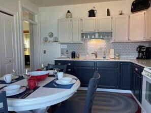 Cookware/dishes/utensils, dining tables - Historic Lighthouse Assistant Keeper's Apartment just off M22 north of Frankfort (Frankfort)