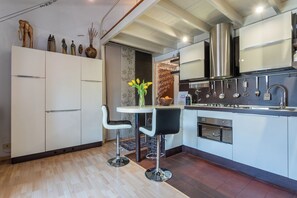 Condo | Private kitchen | Full-size fridge, oven, stovetop, cookware/dishes/utensils - Statuto Ethnic Home by Wonderful Italy (Turin)