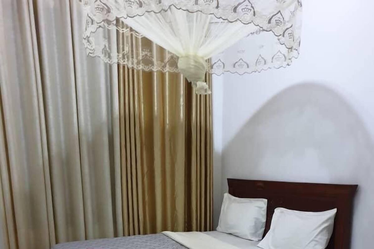 Double Room, City View | Bathroom | Shower, slippers, soap, toilet paper