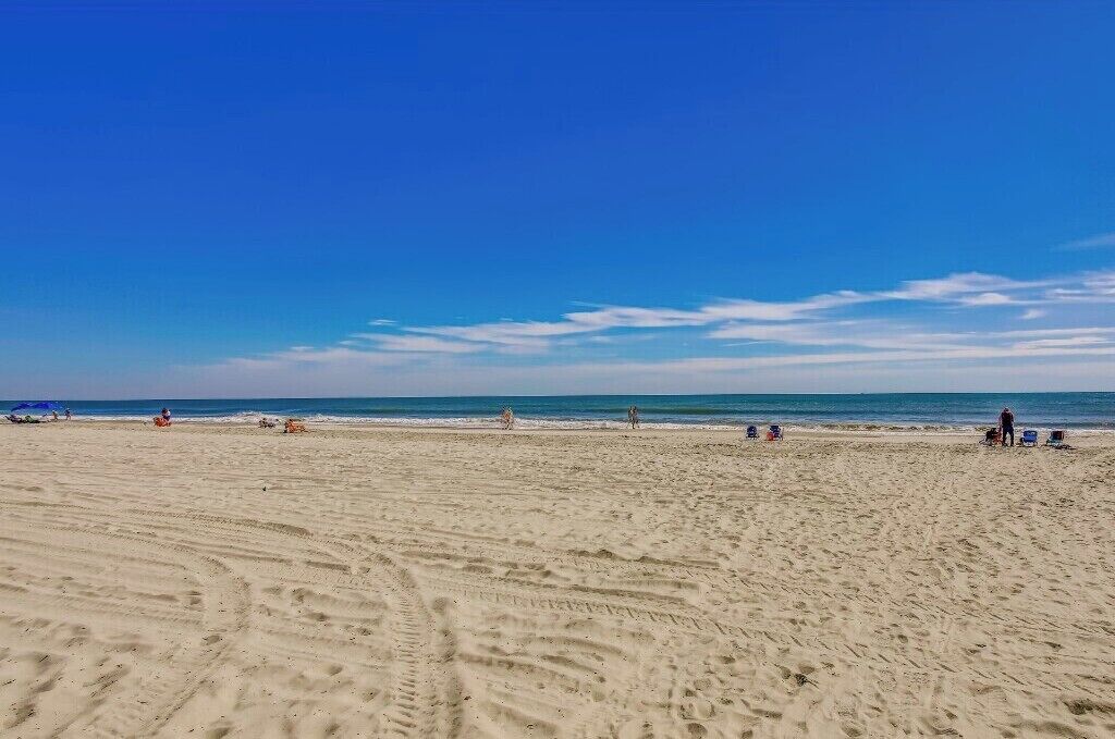 Chaises longues, serviettes de plage