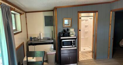 Rustic cabins in secluded campground with lake access and woods to wander in.