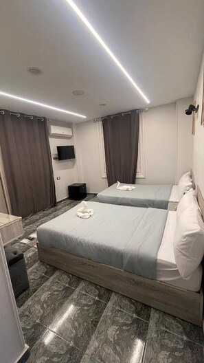 Deluxe-dobbeltværelse - 2 soveværelser - byudsigt | Premium-sengetøj, Select Comfort-senge, gratis Wi-Fi, sengetøj