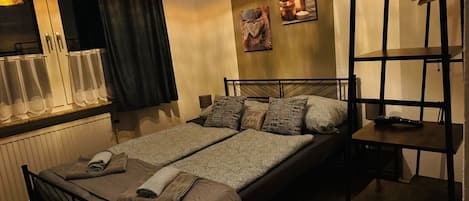 2 bedrooms, desk, iron/ironing board, travel crib