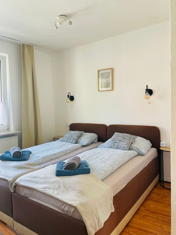 2 bedrooms, desk, iron/ironing board, travel cot