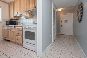 Fridge, microwave, oven, stovetop - Oceanfront Corner Condo with Pool (Ocean City)