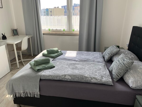 2 bedrooms, desk, iron/ironing board, travel crib