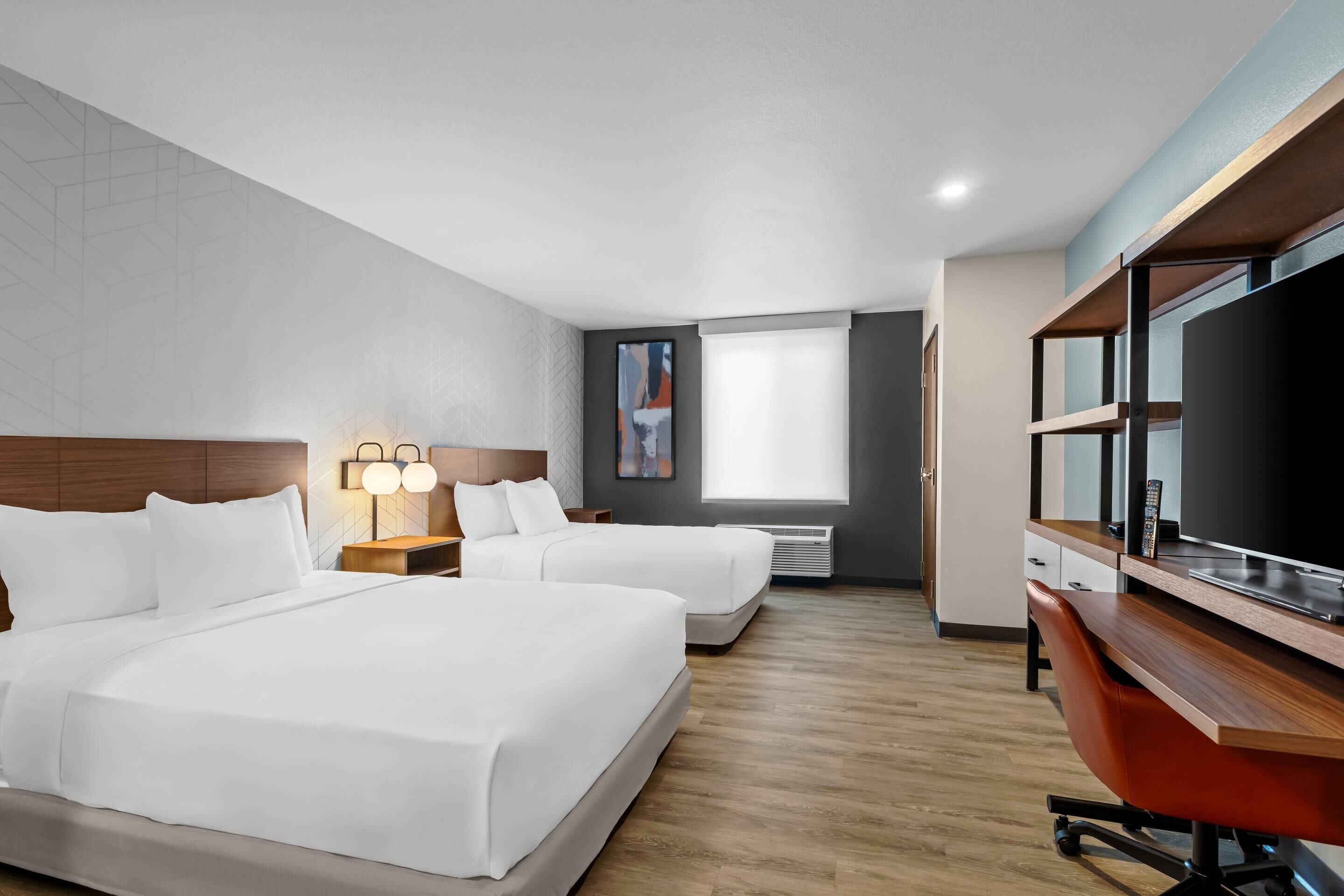 ห้องสวีท, เตียงควีนไซส์ 2 เตียง, ปลอดบุหรี่ | ผ้าม่านกันแสง, Wi-Fi ฟรี, ผ้าปูที่นอน