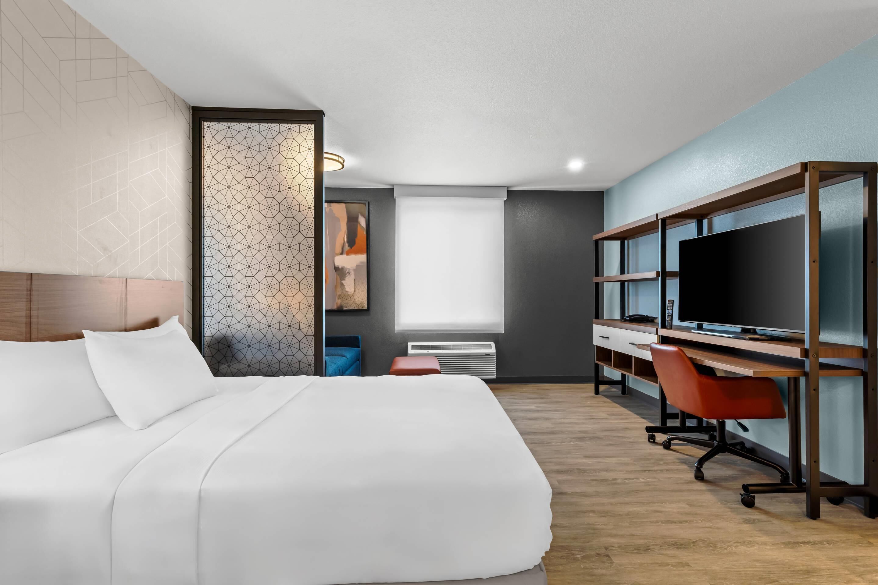 Suíte, 1 cama Queen, para não fumantes | Cortinas blackout, Wi-Fi de cortesia, roupa de cama