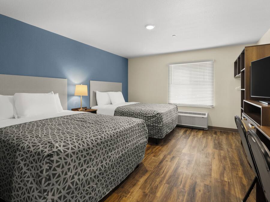 Suite, 2 queensize bedden, niet-roken | Een bureau, een laptopwerkplek, beddengoed