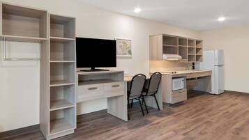 Desk, laptop workspace, bed sheets