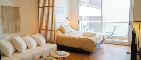 Studio, balcon, vue ville (5.3)