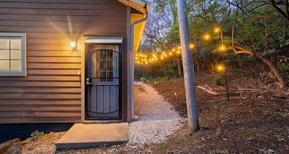 Cozy studio located STEPS from the UofA campus and nestled in secluded woods!