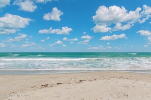 On the beach, sun-loungers, beach towels